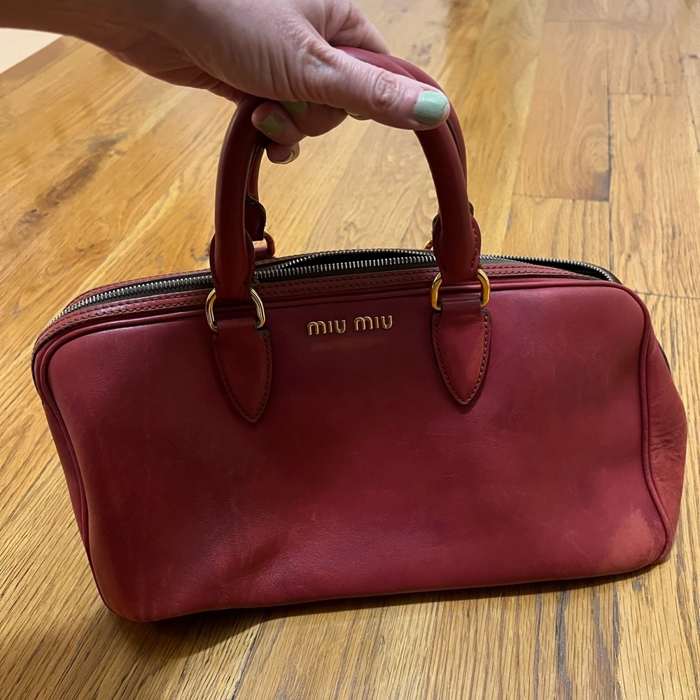 Miu Miu Red Leather Duffel Bag with Structured Design
